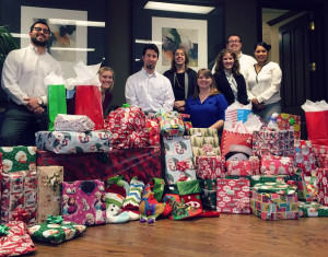 Attorneys at Phillips Murrah wrapped gifts for Oklahoma Family Network.