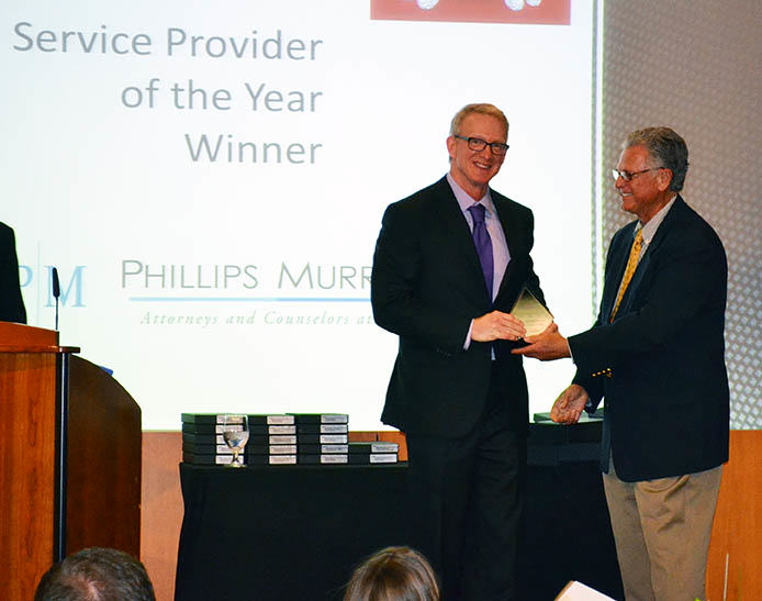 Phillips Murrah Of Counsel attorney, David Walls receives the Service Provider of the Year award at the ASAOK Denim and Diamonda Awards Gala onApril 28, 2015.