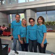 Chance Pearson, OCBA Community Service Committee Chair, with Director Nicholle Jones Edwards, Jenna and Claudette Greenway, Cavett Kids Board Member.