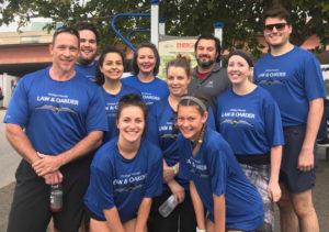 Law & Oarder, Phillips Murrah's rowing team, gets ready to compete in the 2018 Oklahoma Regatta Festival.
