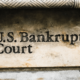 The cornerstone of a United States government building shows directors to the U.S. Bankruptcy Court.