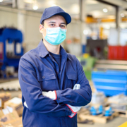 Stock image of industrial worker wearing a mask