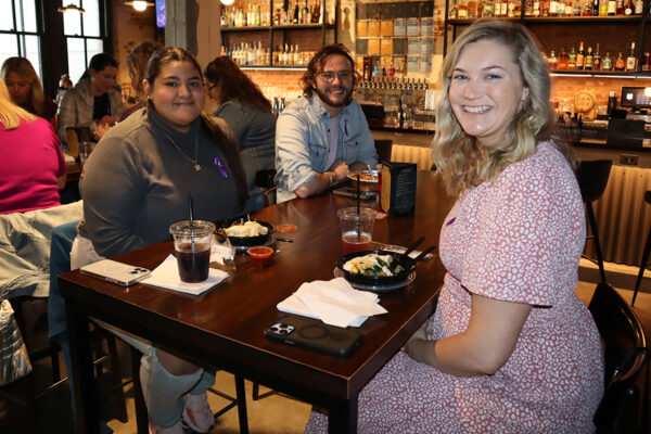 Phillips Murrah attorneys at a table IWD 2024