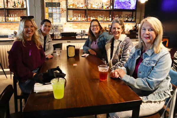 Phillips Murrah attorneys at a table IWD 2024