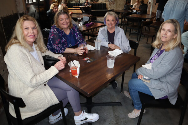 Phillips Murrah attorneys at a table IWD 2024