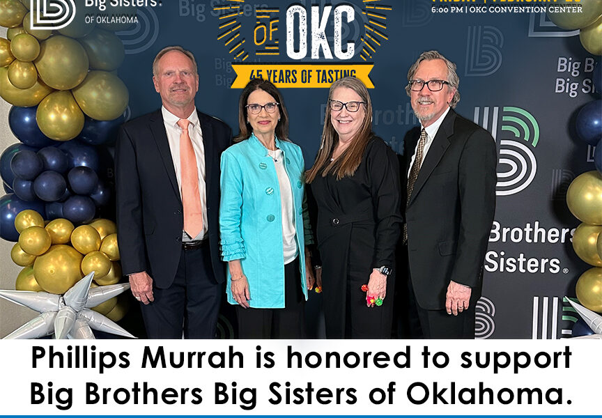 2024 Taste of OKC attendees standing in front of promotional banner