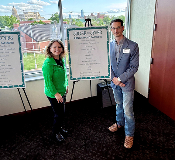 Oklahoma’s Credit Union VP of Member Resolutions Cara Huckabee and Phillips Murrah Attorney Jason Sansone.