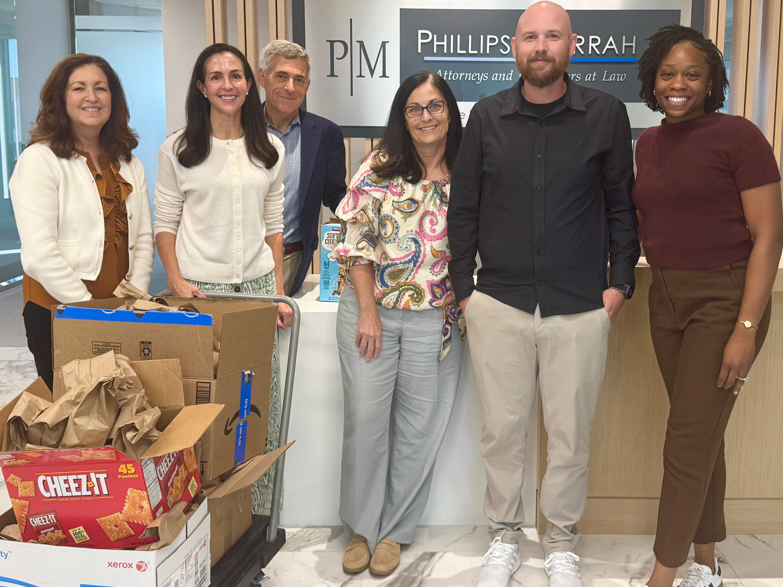 Janet Hendrick, Michele Spillman, Mark Golman, Cheryl Scott-Lewars, Trent Jenkins, Nicole Iloanya from Dallas taking a photo.