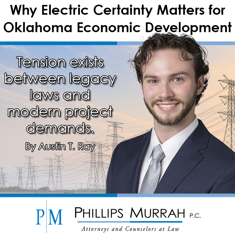 Attorney portrait with electric transmission lines in the background.