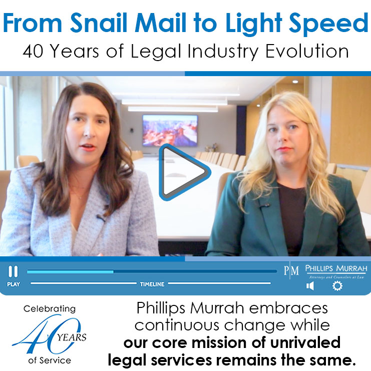 two women phillips murrah lawyers facing camera
